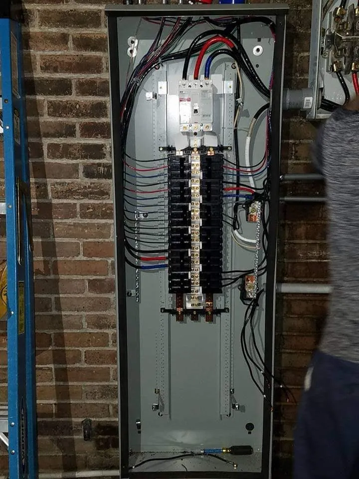 Open residential breaker panel during installation